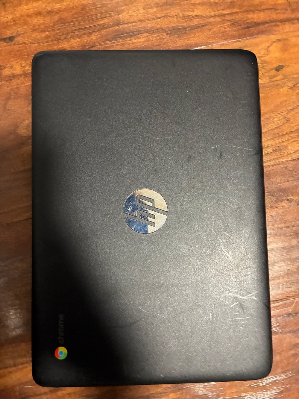 HP Black Chromebook with Silver HP Logo